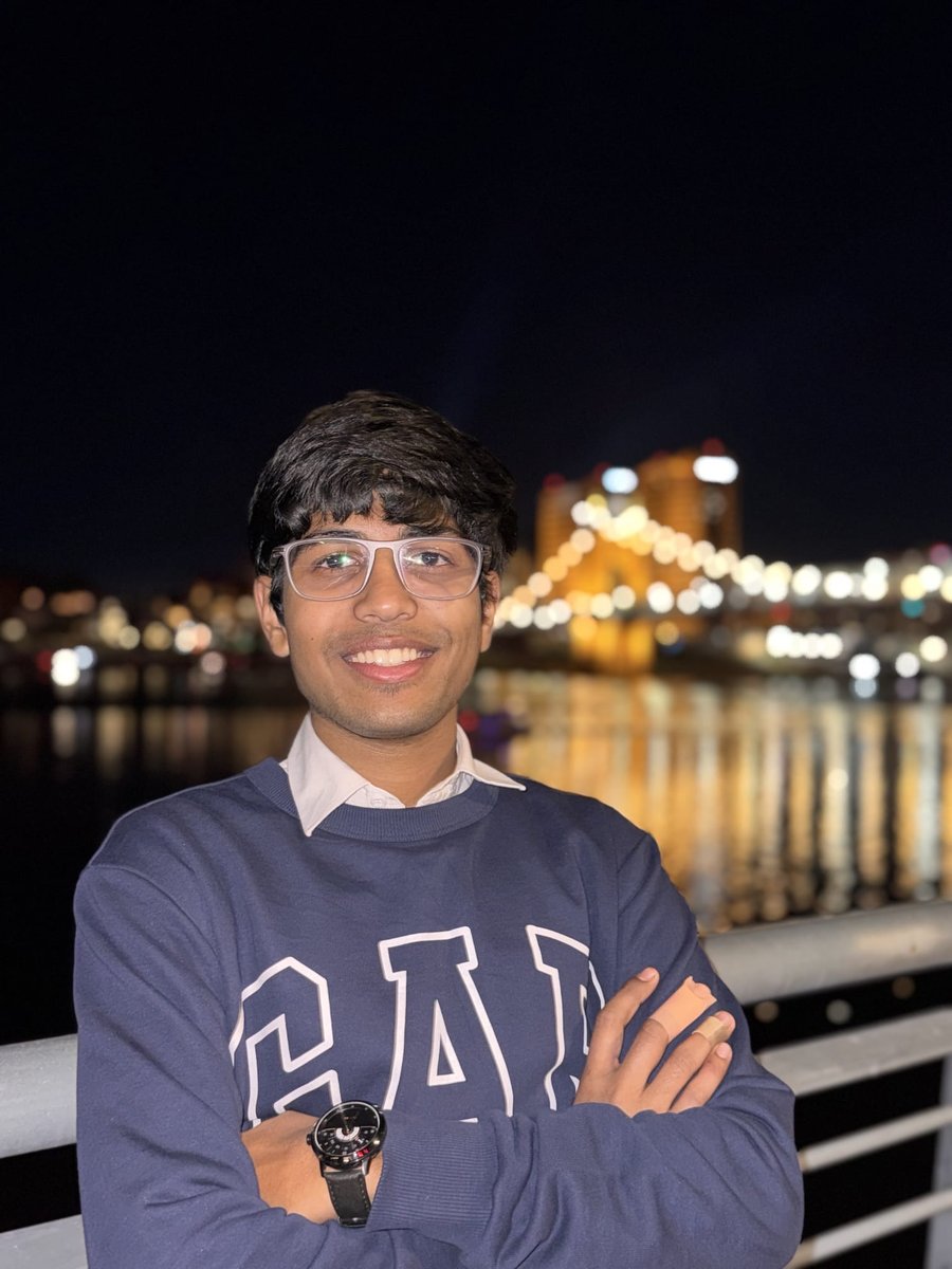 Anuj on the Cincinnati riverfront at night.